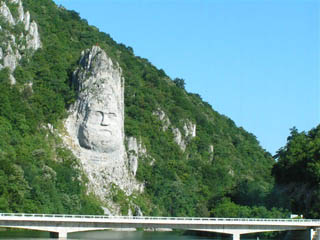 Man's face carved into rock along the Danube